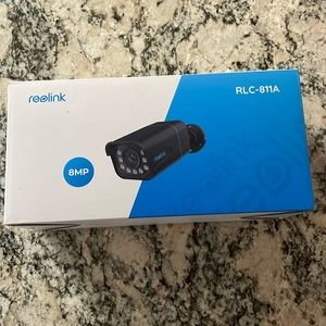 Realink camera ripped box